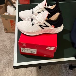 Women’s size 12 new Balance running shoes